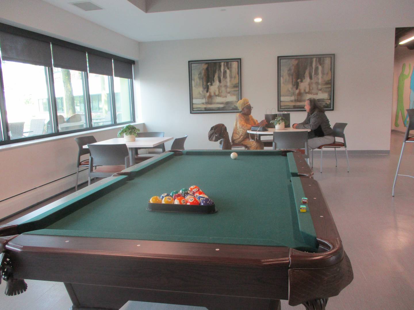 Residents at Stevenson Crossing meet at a community room in the newly redesigned building. June 5, 2025
