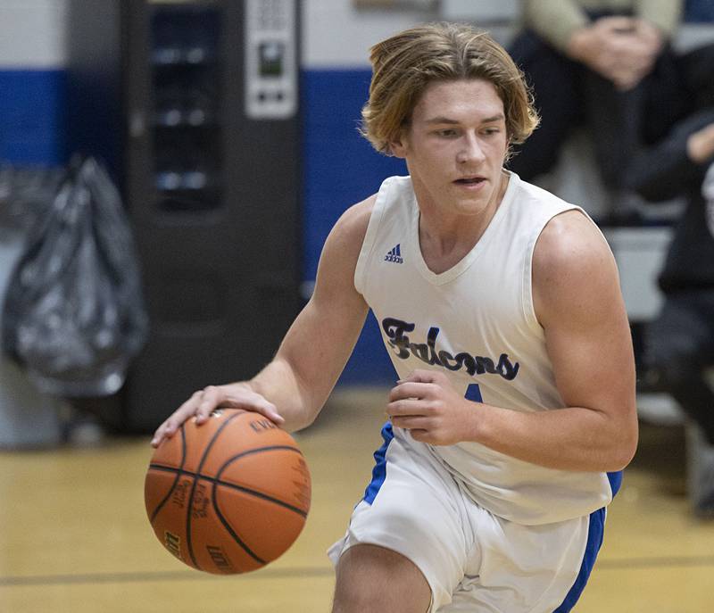 Faith Christian’s Kevin Webb drives the baseline against QC Christian Tuesday, Dec. 9, 2025.