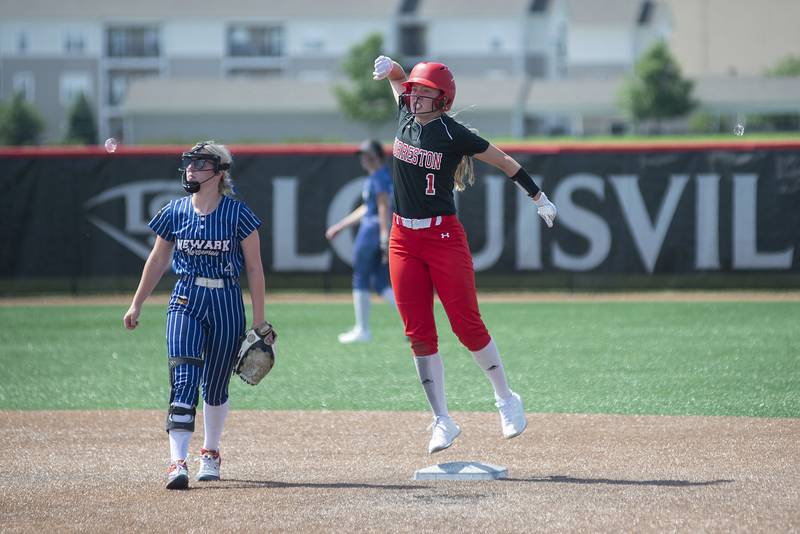 Forreston’s Rylee Broshous celebrates a hit that put the Cardinals ahead against Newark Saturday, June 4, 2022 during the IHSA Class 1A softball state third place game.