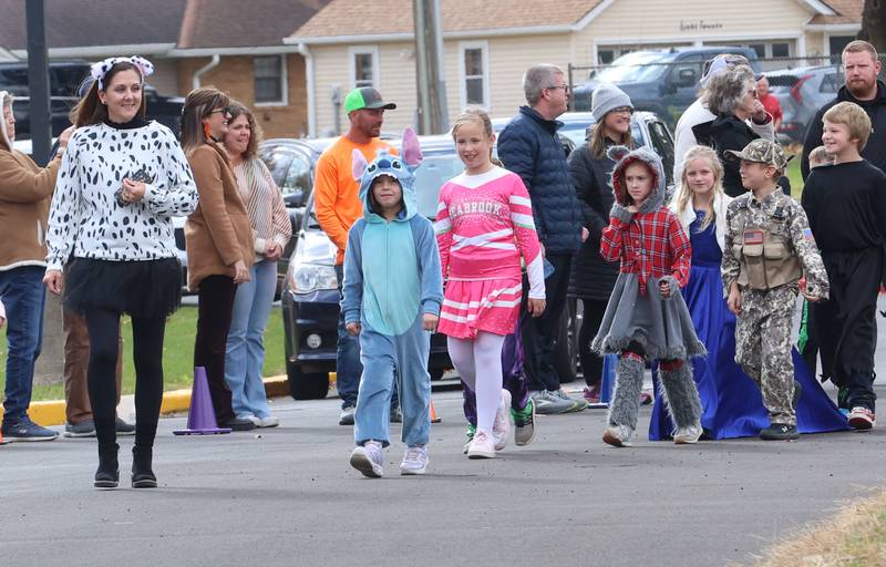 Students from Jefferson Elemertary walk around the school during a Halloween parade on Friday, Oct. 31, 2025 in Princeton.