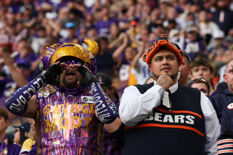 Football fans watch the field during the second half of an NFL football game between the Minnesota Vikings and Chicago Bears, Sunday, Nov. 16, 2025 in Minneapolis. Chicago won 19-17. (AP Photo/Stacy Bengs)