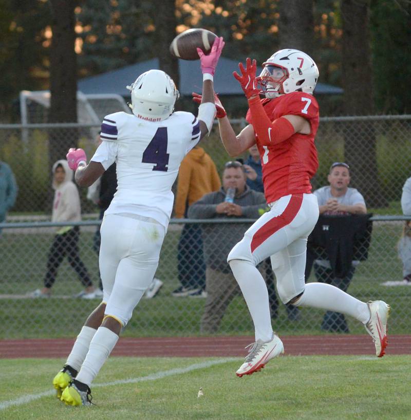 Oregon's Ethan Peeling (7) reaches for a pass as a Rockford Lutheran player gets a hand on the ball during action on Friday, Sept. 5, 2025 at Landers-Loomis Field in Oregon.
