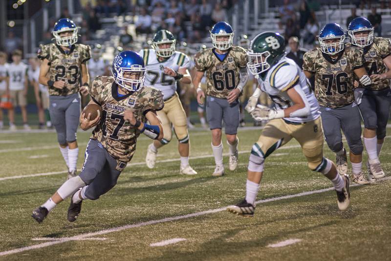 Newman’s Carter Rude turns the corner against St. Bede Friday, Sept. 16, 2022.