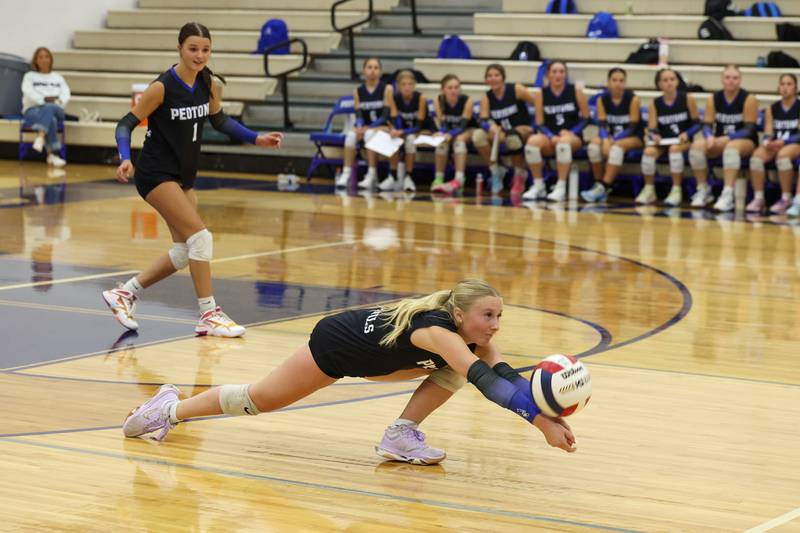 Peotone's Peyton Bisping dives for a dig during the Blue Devils' loss in three sets, 19-25, 25-19, 25-21, to Manteno on Tuesday, Sept. 23, 2025.
