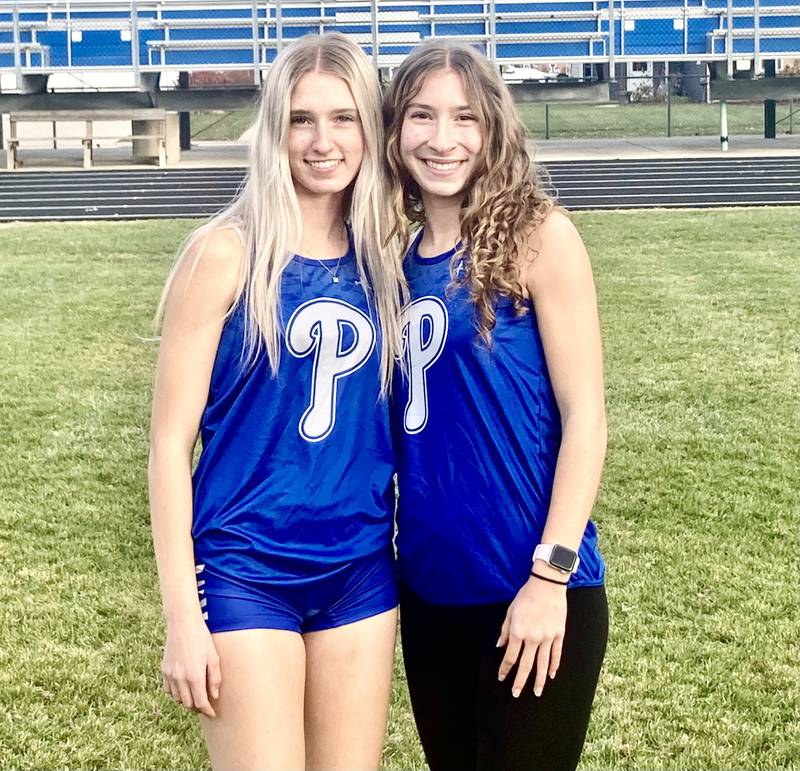 Princeton's Payton Frueh (left) and Ruby Acker co-authored a season of success for the Princeton cross country team this fall.