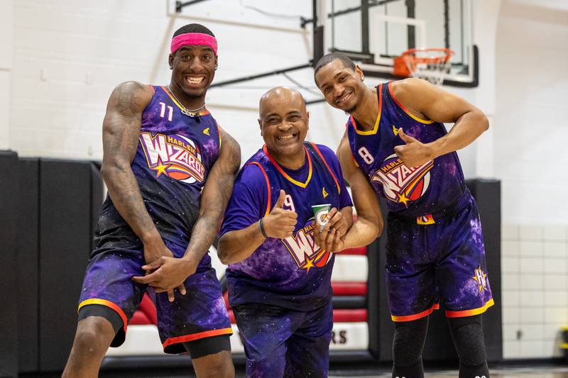 Kamil “Dragon” Brown (77), Arnold “A-Train” Bernard (9) and Devon “Livewire” Curry (8) of the Harlem Wizards pose for photo on Wednesday, April 16, 2025 at Woodland High School in Streator.