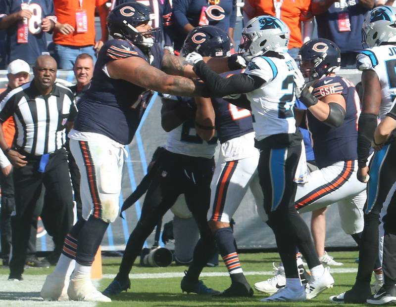 A scuffle breaks out betweenChicago Bears offensive lineman Matt Pryor and Carolina Panthers safety Jammie Robinson on Sunday, Oct. 6, 2024 at Soldier Field in Chicago.