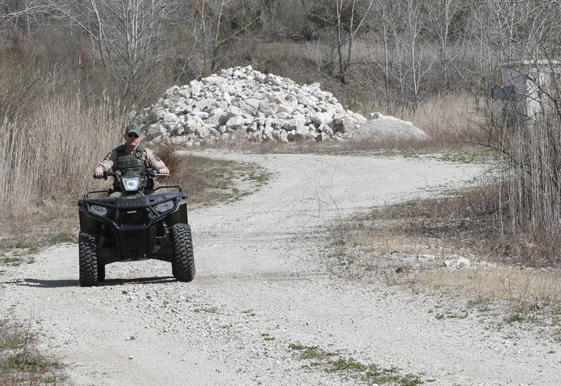 Conservation officer Scott Wagner drives an ATV through part of the Matthiessen Annex area on Wednesday, March 27, 2024 near Oglesby. In October 2018, the Illinois Department of Natural Resources purchased 2,628 acres from Lone Star Industries Inc. near Oglesby, Illinois in rural LaSalle County. This
formerly mined property is adjacent to Matthiessen State Park and is now referred to as the Matthiessen Annex property. In its reclaimed state, this property will provide recreational opportunities, as well as habitat and public access to the Illinois River and Bailey Creek.