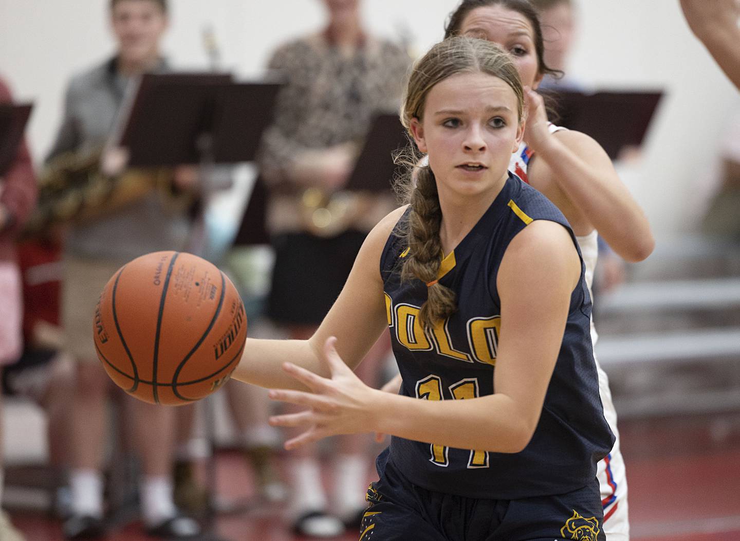 Polo’s Courtney Grobe works against Oregon on Tuesday, Nov. 22, 2022.