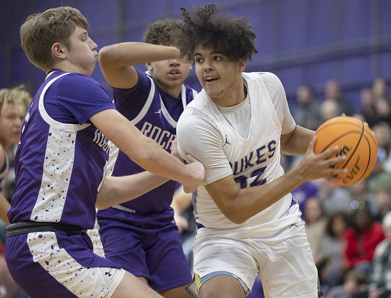 Dixon’s Darius Harrington works against Rochelle Monday, Dec. 9, 2024, at Dixon High School.