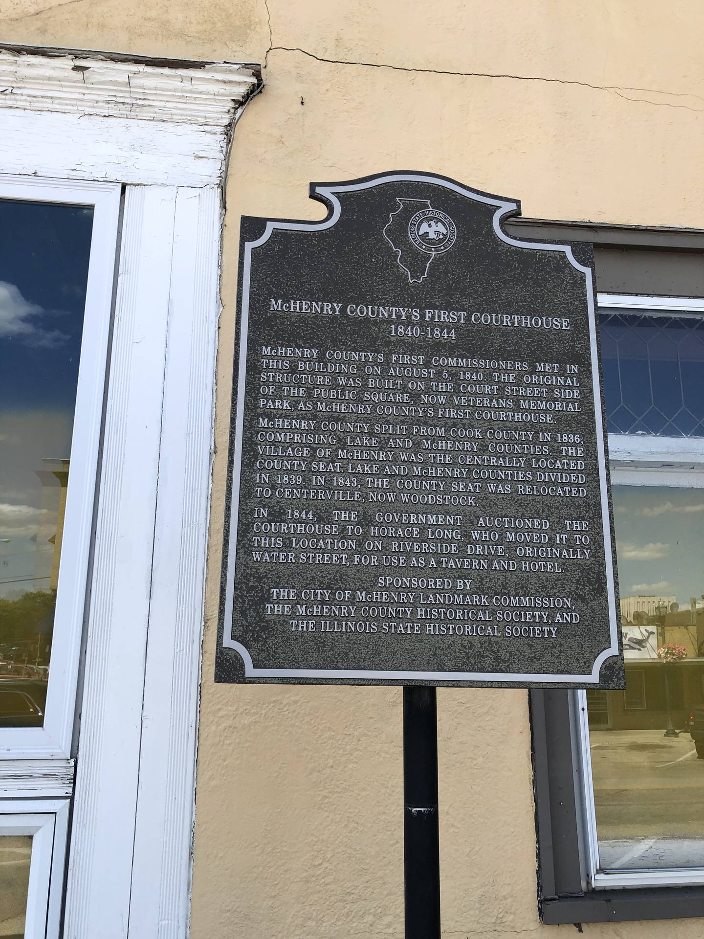 The historic marker at The Courthouse tavern in McHenry, seen here on Thursday, June 2, 2022, just as work renovation work began. The marker sits next to the patio now.