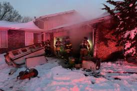 Joliet firefighters put out garage fire