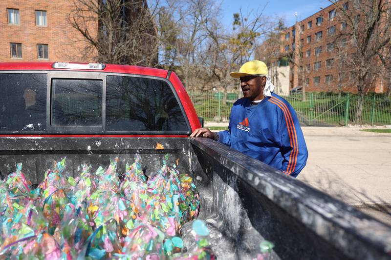 Roger Gates stands by his pickup truck filled with Easter baskets. For years Roger Gates has been giving out Easter baskets in the community. Saturday, April 16, 2022, in Joliet.