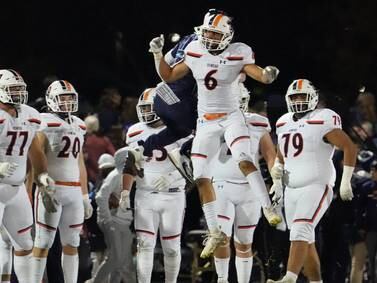 Oswego pulls away late to beat Oswego East, completes perfect regular season