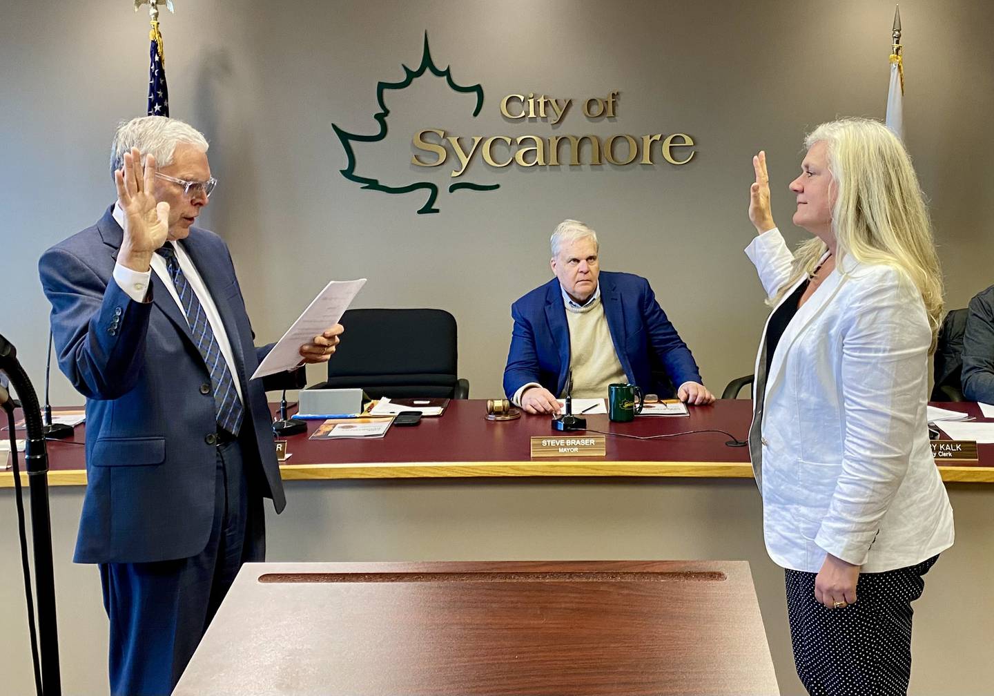 Sycamore City Clerk Mary Kalk (right) is sworn in to office on Monday, May 5, 2025, at the Sycamore City Center, after she sought reelection unopposed in April.
