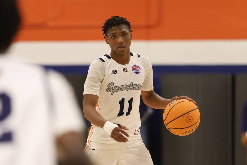 Romeoville's Jamarri Fears works the ball against Bolingbrook on Tuesday, Dec. 2, 2025 in Romeoville.