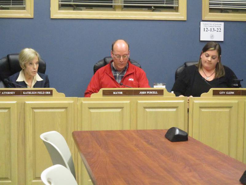 Yorkville City Attorney Kathleen Field Orr, from left, Mayor John Purcell and City Clerk Jori Behland consider objections to the nominating petitions of aldermanic candidates on Jan. 4, 2023.