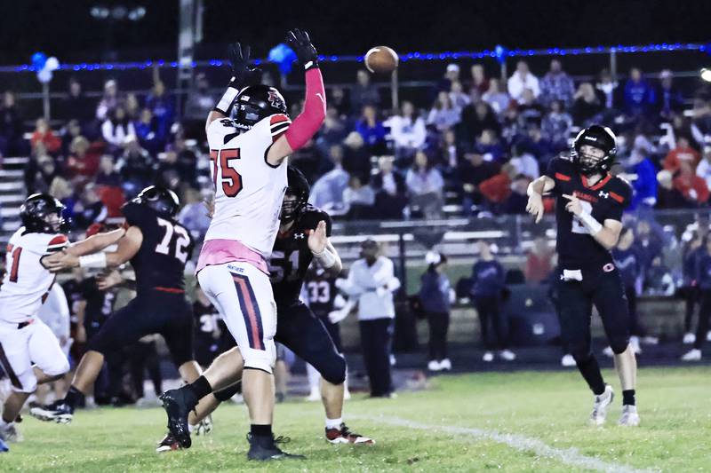 Erie-Prophetstown Panther #75 Caleb Reymer used his 6'4" frame to block a pass by Orion's #2 Kale Filler Friday, Oct. 10, 2025, in Orion. The Panthers would allow the Chargers only 14 points the entire game but racked up 40 for themselves taking the Panthers to 5-2 for the season.
