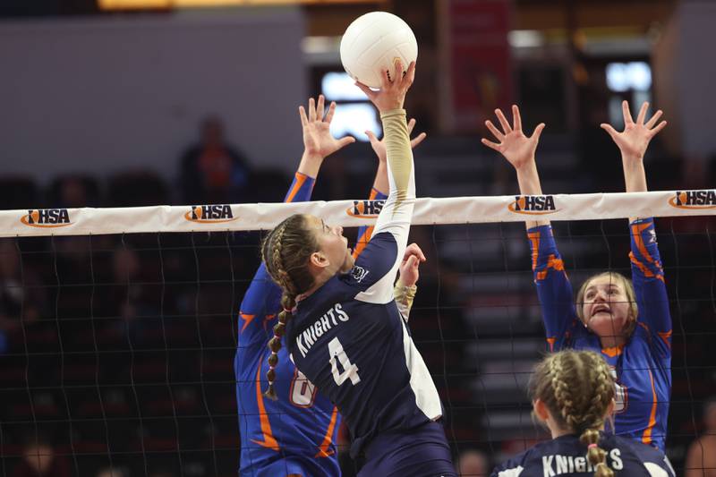 IC Catholic’s Ava Falduto pushes over a shot against Genoa-Kingston in the Class 2A championship match on Saturday in Normal.