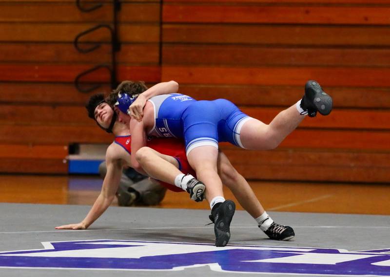 Princeton's Preston Arkels throws his man Thursday night at Prouty Gym.