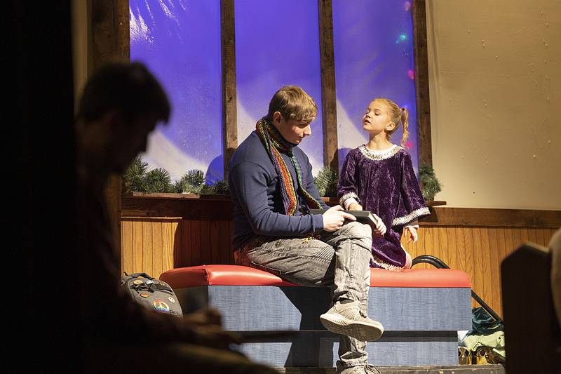 Caleb Hinkle and Kynnedi Smith rehearse a scene from the Polo Area Community Theatre’s rendition of “A Candle in the Window” on Wednesday, Nov. 30, 2022. Performances will be 7 p.m. Friday, Saturday, and Dec. 9 and 2 p.m. Sunday and Dec. 10.