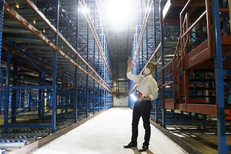 Sean Stofer, COO of Green Data Center Real Estate, Inc., shows a manufacturing and packing area inside the property at the former Motorola headquarters on Thursday, June 10, 2021 in Harvard.