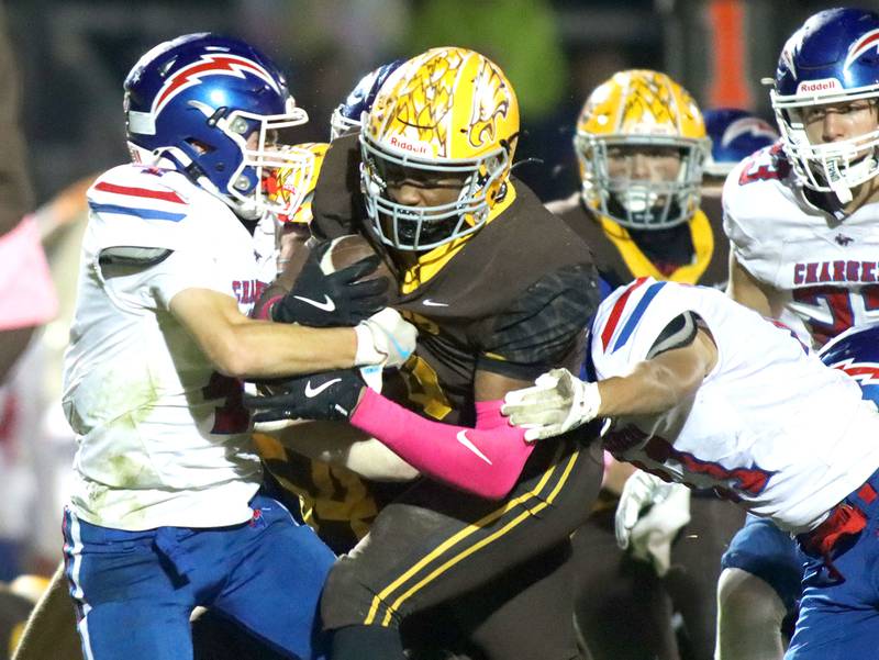 Jacobs’ Michael Cannady runs the ball against Dundee-Crown in varsity football  at Jacobs High School in Algonquin on Friday, Oct. 10, 2025.