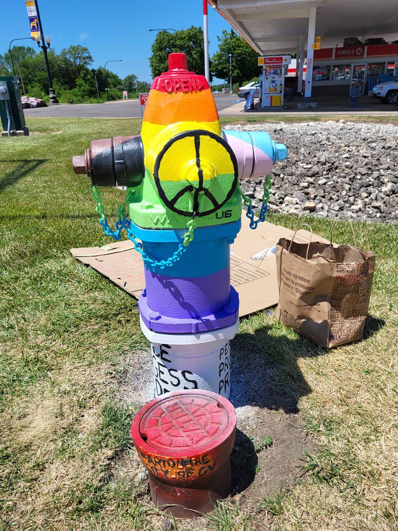 The Rainbow and Transgender flag colors on the fire hydrant at Kirk Road and East State Street was painted by Geneva resident Chrissy Swanson as part of the Art on Fire program sponsored by the city. Someone spray-painted white paint over her work in an act of vandalism.
