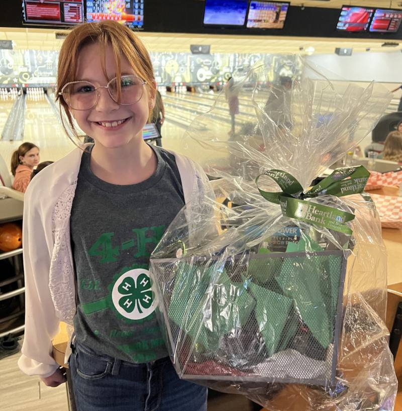 Annalee Korzik of Millbrook Mighty Ones 4-H Club won the prize donated by Heartland Bank & Trust Company for highest individual fundraiser.