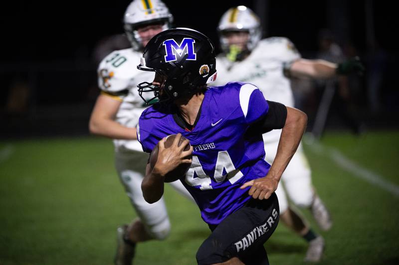 Manteno's Levar Lee carries the ball on a play against Coal City on Friday, October 3, 2025.