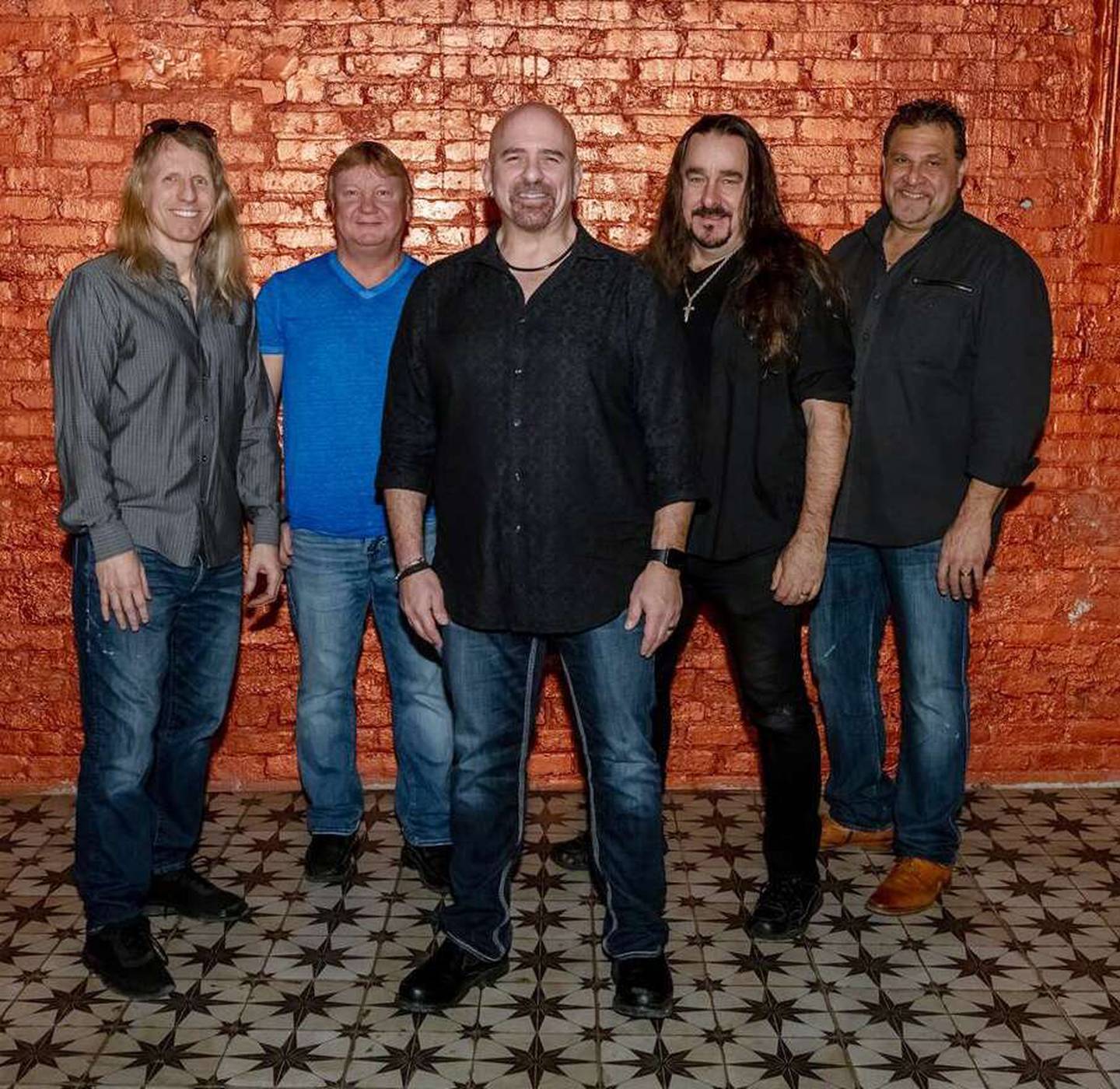 Vocalist Dave Mikulskis, center, joined the popular 1980s cover band Hi Infidelity in 2001. His bandmates are, from left, bassist Danny Weymouth, drummer Jim Warren, guitarist Dave Uhrich and keyboardist Bobby Scumaci.