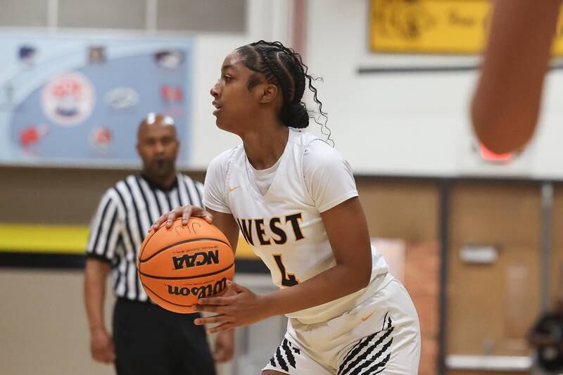 Joliet West’s Gabrielle Gavin looks for a play against Joliet Central on Thursday, Jan 30, 2025 in Joliet.