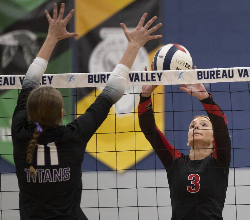 Erie-Prophetstown’s Kallie Wiseley plays the ball against El Paso-Gridley’s Reese Deckard Thursday, Nov. 7, 2024, during the class 2A volleyball sectional championship at Bureau Valley High School.