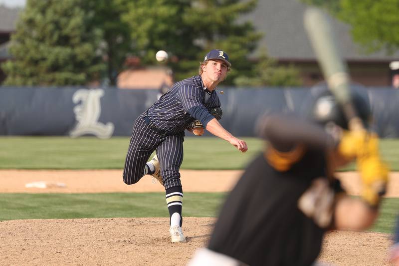 Lemont’s Mike Biscan delivers a pitch against Hinsdale South on Wednesday, May 24, 2023, in Lemont.