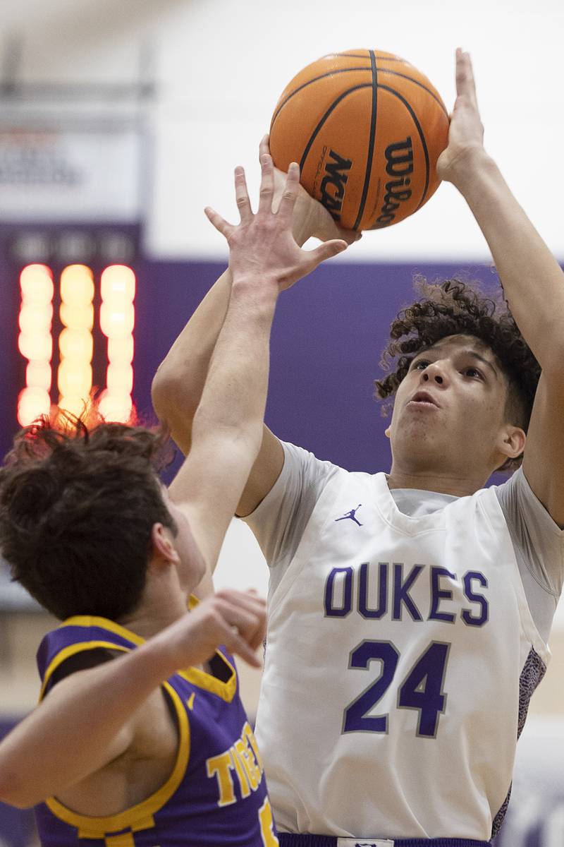Dixon’s Armahn McGowan puts up a shot against Sherrard Friday, Feb. 20, 2026.