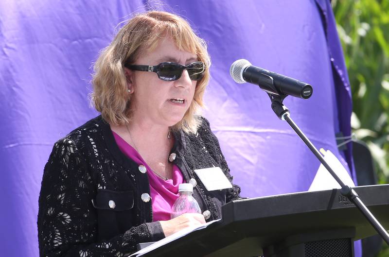 Kathy Ross, Vice President of Business Services and Fiance gives remarks at Illinois Valley Community College, speaks during a groundbreaking ceremony on the new Dr. Alfred E. Wisgoski  Agricultural Education on Friday, Aug. 22, 2025 at Illinois Valley Community College in Oglesby. The new building, received a one-million dollar donation from the Wisgoski family, funds from the federal Economic Development Administration and the state of Illinois Department of Commerce and Economic Opportunity, will not only provide physical spaces that reflect the program’s growth, innovation, and capabilities, but the IVCC Agricultural Education Center will also serve as a focal point for agricultural industry activities within the community. The building will take one-year to complete.