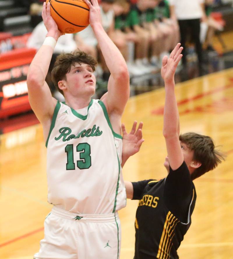 Rock Falls's Austin Castaneda eyes the hoop against Putnam County's AJ Furar during the 50th annual Colmone Classic on Monday, Dec. 9, 2024 at Hall High School.