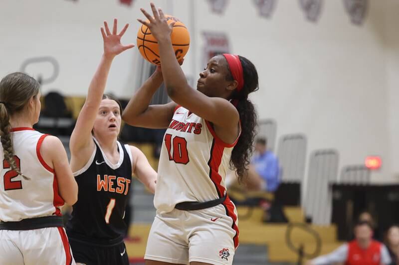 Lincoln-Way Central’s Kiya Newson-Cole takes a shot against Lincoln-Way West on Tuesday, Jan 28, 2025 in New Lenox.