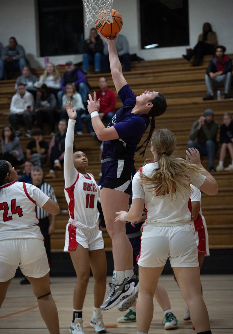 Manteno's Maddie Gesky, center, puts up a shot under the net against Bradley-Bourbonnais in the Beecher Fall Classic on Tuesday, November 18, 2025.