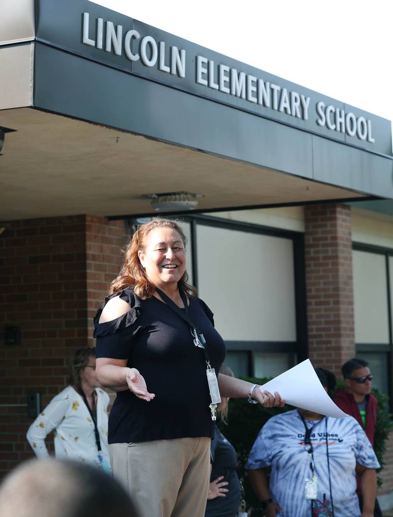 Lincoln Elementary School Principal Jennifer Tallitsch welcomes students for the first day of classes Wednesday, Aug. 14, 2024, at the school in DeKalb.