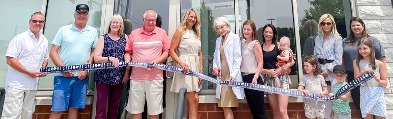 The Sycamore Chamber of Commerce welcoming NUVO Aesthetics Clinic with a ribbon-cutting