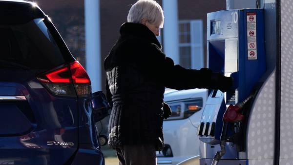 Inflation cooled slightly in December though it remains above Fed’s target