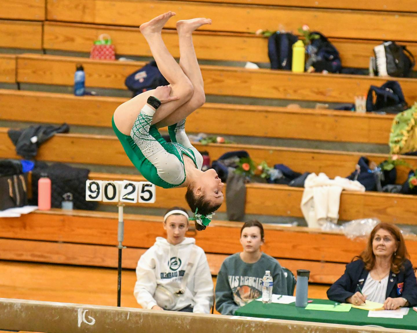 Angela Stangaronez of York High School finishes her beam routine during the confrance meet held at Glenbard West on Saturday Jan. 27, 2024.