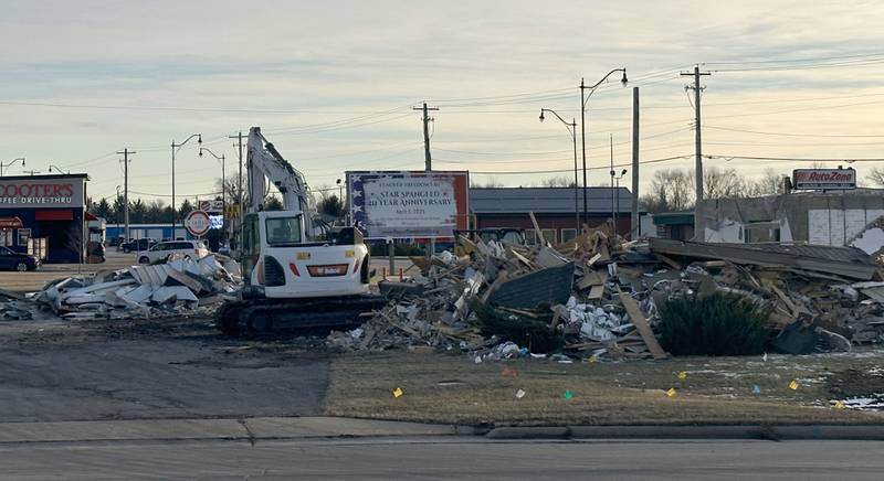 An excavator demolished the former Midland Bank building on Thursday, Jan. 16, 2025 at the southeast corner of Backbone Road and North Main Street in Princeton. The lot will be cleared and an Aldi will be erected sometime this year.