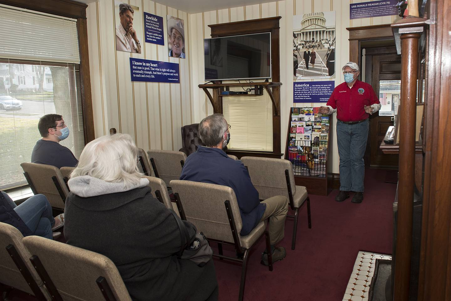 Ronald Reagan Preservation Foundation director Pat Gorman announces to a group of volunteers Friday afternoon that the boyhood home in Dixon has a new caretaker. The Young America's Foundation is also the caretaker of the the Reagan ranch in California, the only home Reagan owned while President.