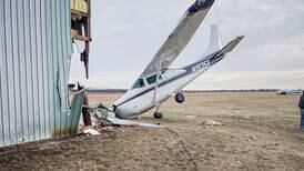 Plane hits building while taxiing at airport near Harvard