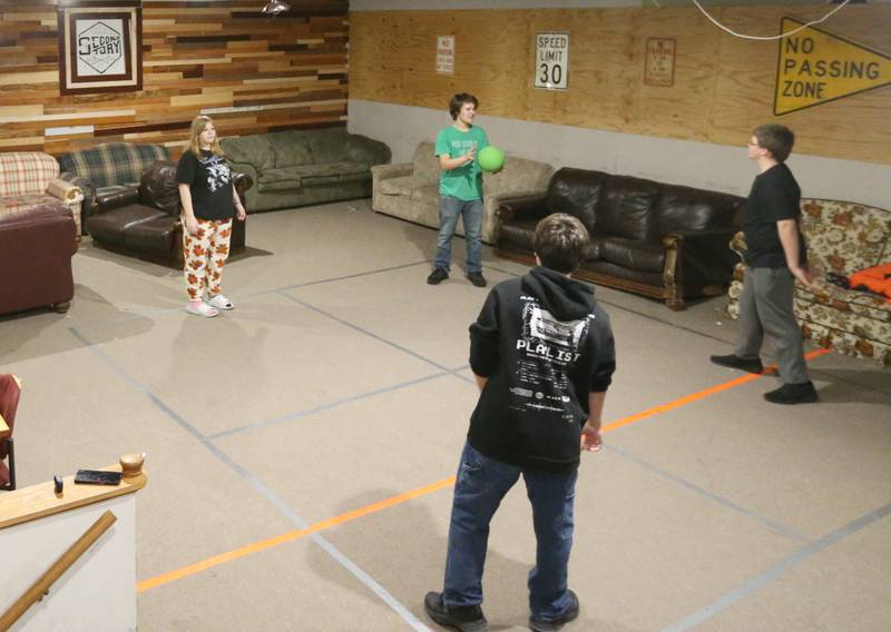 Teenagers play games inside the Second Story Teen Center on Tuesday, Dec. 5, 2023 in Princeton.
