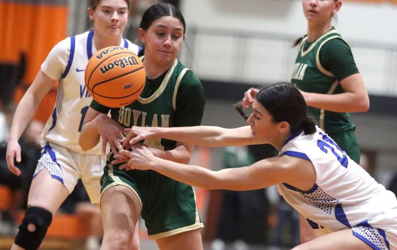 Boylan’s Adriana Salamone, left, and Geneva’s Ella Wilkison tussle for the ball  in girls IHSA Class 3A Sectional basketball on Tuesday, Feb. 24, 2026, at Crystal Lake Central High School in Crystal Lake.