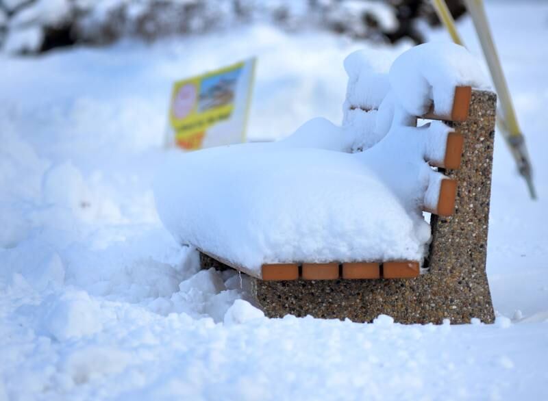 A bench in Mt. Morris along Brayton Road in Mt. Morris is covered with snow on Saturday, Jan. 13, 2024. Friday's winter storm dumped 10-12 inches of snow on the village.