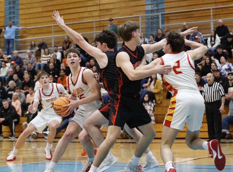 Batavia's Dane Farrar (15) looks for an opening against the Wheaton Warrenville South defense during the IHSA boys class 4A Willowbrook regional final between Wheaton Warrenville South and Batavia on Friday, Feb. 27, 2026 in Villa Park, IL.